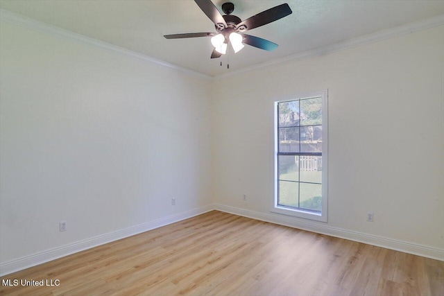 spare room featuring ornamental molding, light hardwood / wood-style floors, and ceiling fan