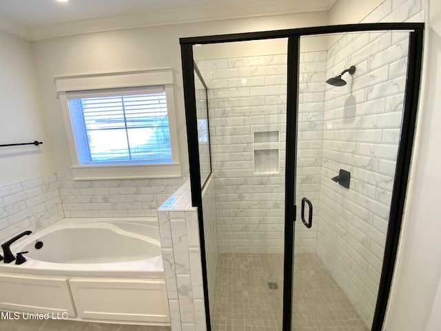 182 Sweetbriar Cir, Canton, MS 39046 - full bathroom featuring a bath, a shower stall, and ornamental molding