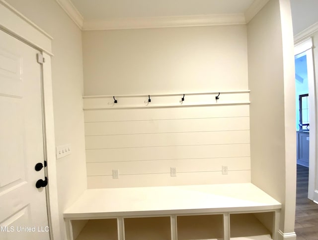 182 Sweetbriar Cir, Canton, MS 39046 - mudroom featuring crown molding, baseboards, and wood finished floors