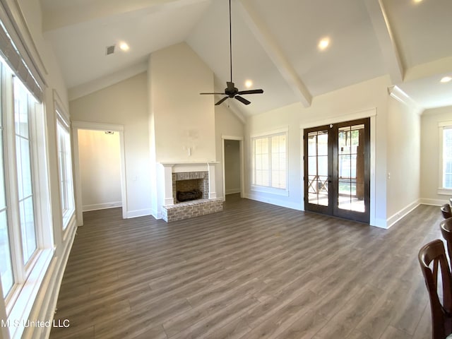 182 Sweetbriar Cir, Canton, MS 39046 - unfurnished living room with baseboards, ceiling fan, french doors, high vaulted ceiling, and dark wood-type flooring