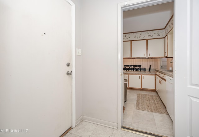 interior space featuring light tile patterned floors