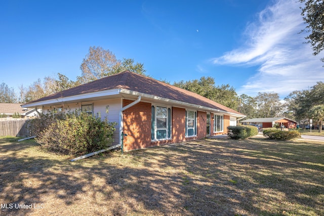 exterior space with a front yard