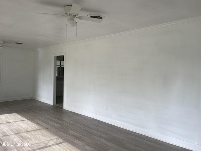 2938 Oak Forest Dr, Jackson, MS 39212 - unfurnished room with a ceiling fan, wood finished floors, and crown molding