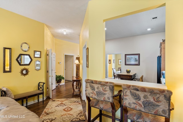 living room with dark wood-type flooring