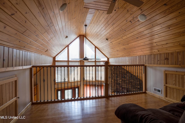 additional living space featuring lofted ceiling, hardwood / wood-style floors, wood ceiling, and ceiling fan