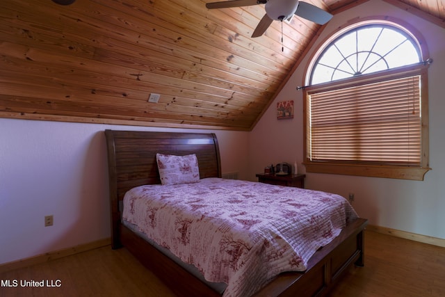 bedroom featuring wood ceiling, ceiling fan, lofted ceiling, and light wood-type flooring