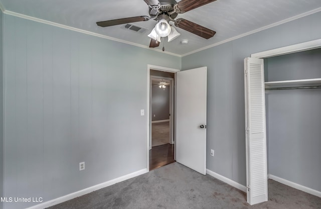 unfurnished bedroom featuring crown molding, light carpet, a closet, and ceiling fan
