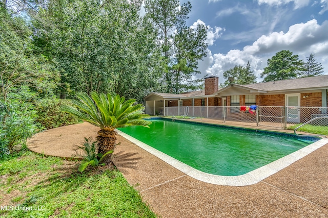 view of pool with a patio area