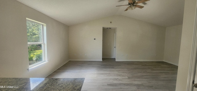 2708 Canty St, Pascagoula, MS 39567 - additional living space with healthy amount of natural light, ceiling fan, wood finished floors, and vaulted ceiling