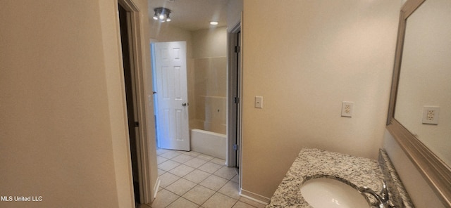 2708 Canty St, Pascagoula, MS 39567 - bathroom featuring tile patterned floors, vanity, and a bathtub