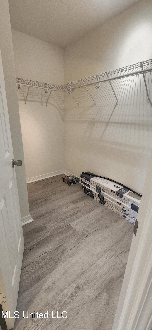 2708 Canty St, Pascagoula, MS 39567 - walk in closet featuring wood finished floors