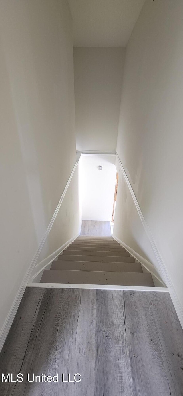 2708 Canty St, Pascagoula, MS 39567 - staircase featuring wood finished floors and baseboards