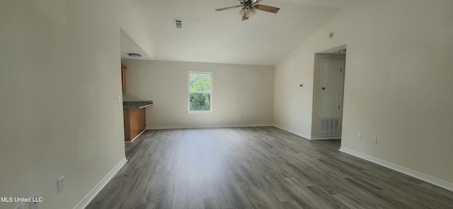 2708 Canty St, Pascagoula, MS 39567 - unfurnished living room with a ceiling fan, lofted ceiling, and dark wood finished floors