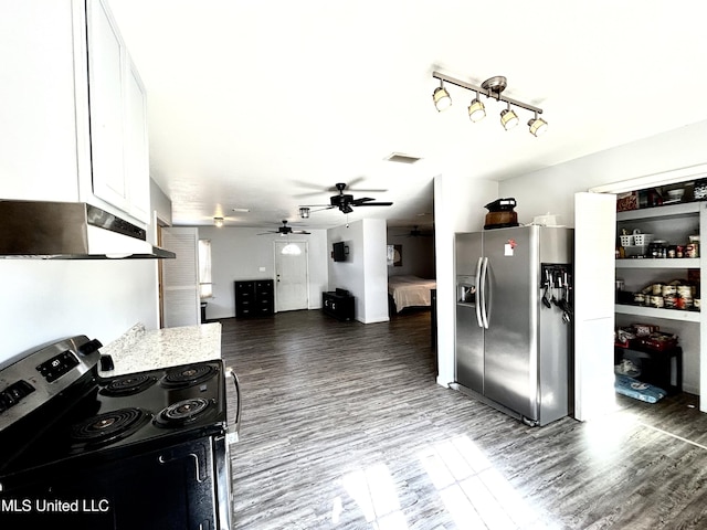 kitchen featuring ceiling fan, appliances with stainless steel finishes, white cabinets, dark wood-type flooring, and light stone countertops