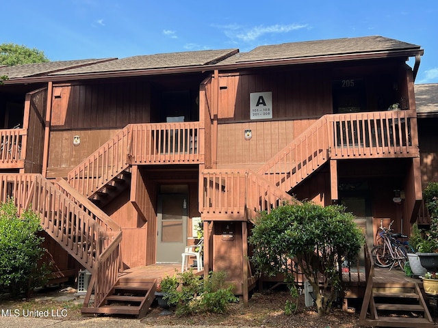206 Lakeside Villa Unit A, Diamondhead, MS 39525 - view of property featuring stairs