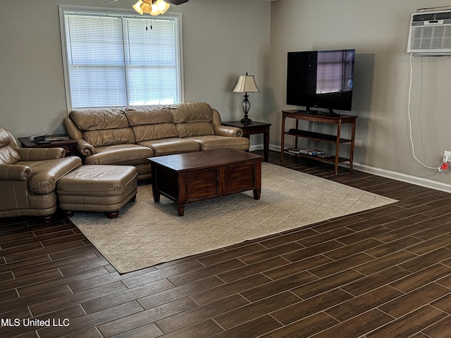 1172 Little Creek Dr, Oakland, MS 38948 - living area with wood finish floors, a wall unit AC, baseboards, and ceiling fan