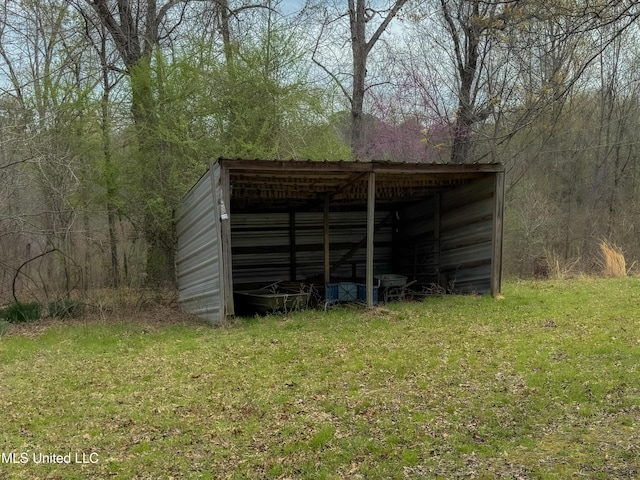 1172 Little Creek Dr, Oakland, MS 38948 - view of pole building with a lawn