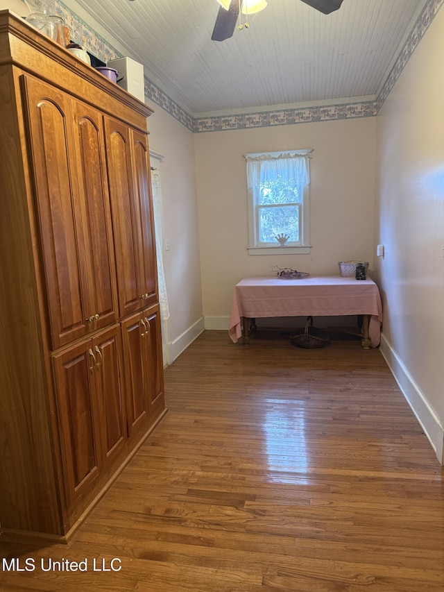 5 Spruce St, Oakland, MS 38948 - unfurnished bedroom featuring ceiling fan, crown molding, baseboards, and wood finished floors