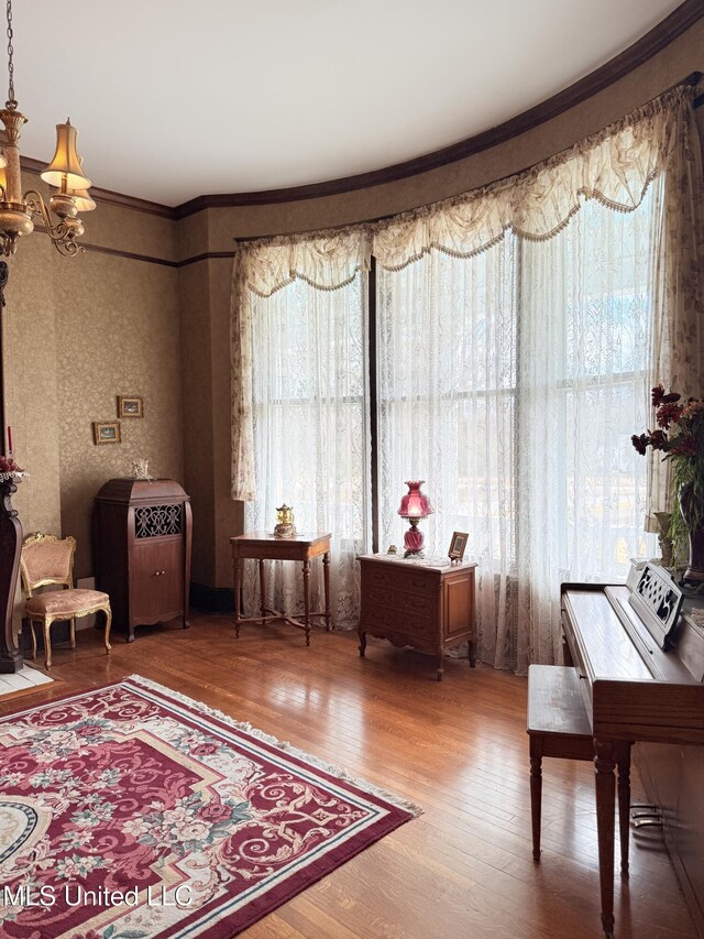 5 Spruce St, Oakland, MS 38948 - sitting room featuring plenty of natural light, an inviting chandelier, and wood finished floors