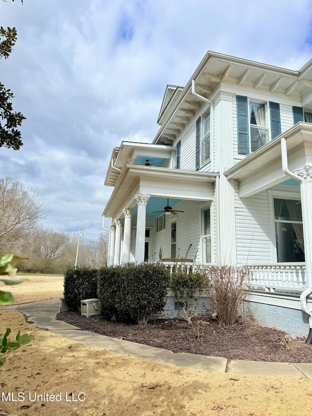 5 Spruce St, Oakland, MS 38948 - view of side of property featuring a ceiling fan and covered porch