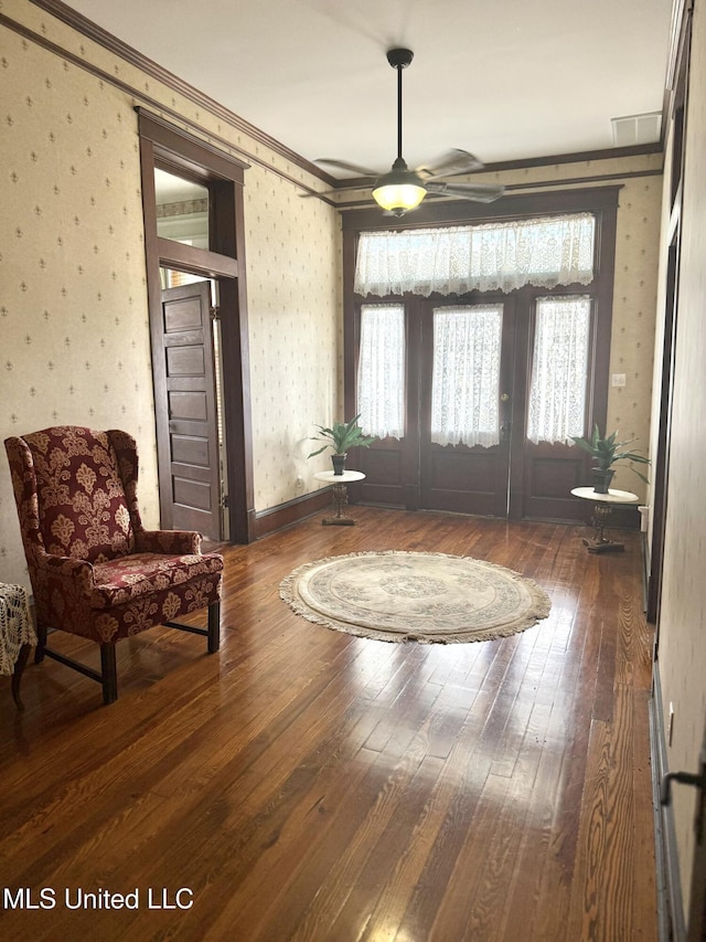 5 Spruce St, Oakland, MS 38948 - foyer with baseboards, hardwood / wood-style flooring, crown molding, and wallpapered walls