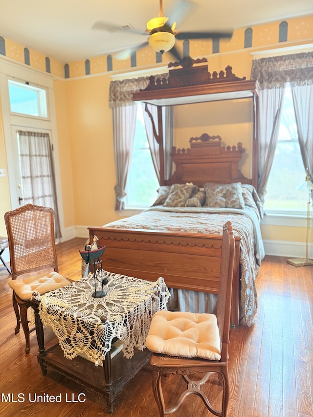 5 Spruce St, Oakland, MS 38948 - bedroom featuring baseboards and hardwood / wood-style flooring