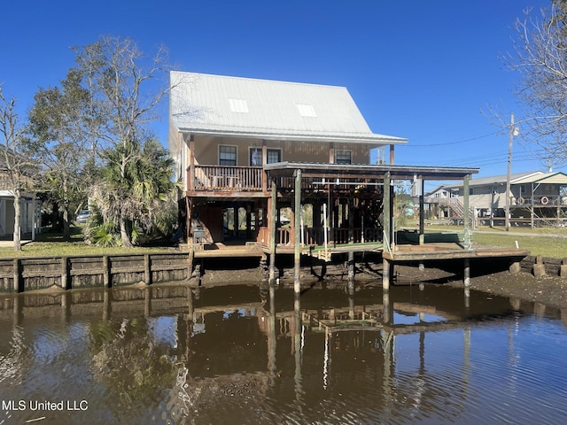 dock area with a deck with water view