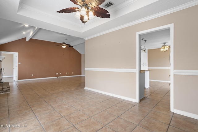 spare room with crown molding, light tile patterned floors, and ceiling fan