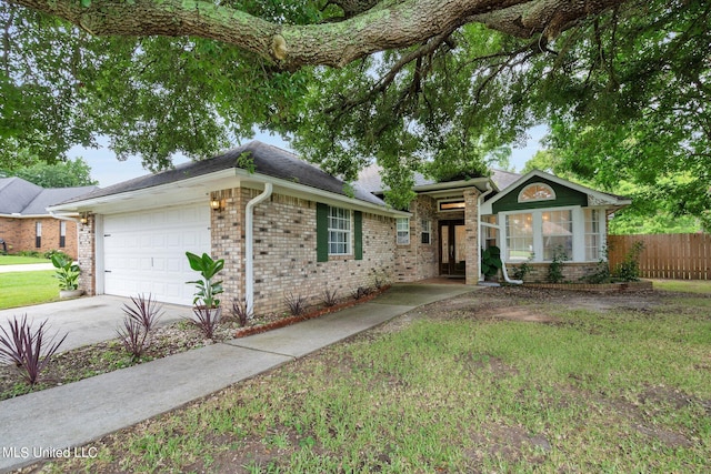 ranch-style house featuring a garage