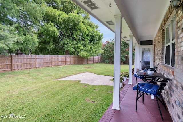 view of yard with a patio area