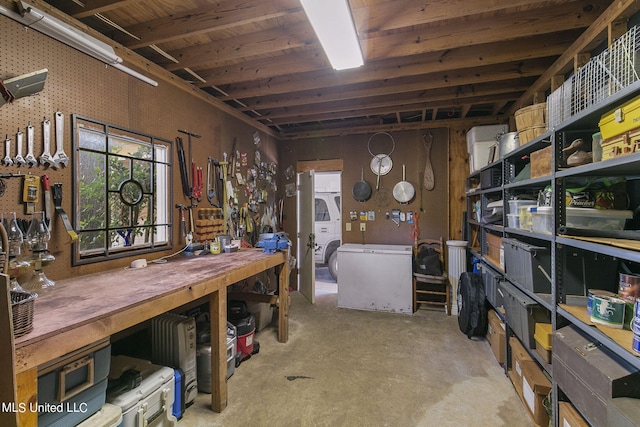 basement featuring a workshop area