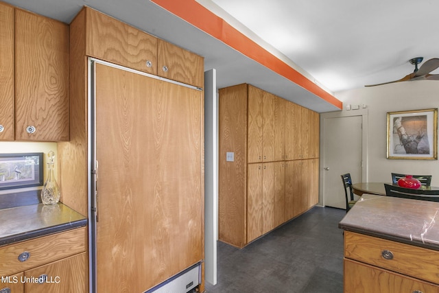 kitchen featuring ceiling fan