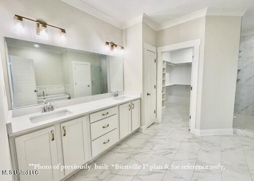 6674 Montclair Ave, Southaven, MS 38672 - full bath featuring a sink, crown molding, a shower stall, double vanity, and marble finish floor