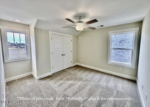 6674 Montclair Ave, Southaven, MS 38672 - unfurnished bedroom with a closet, carpet flooring, and baseboards
