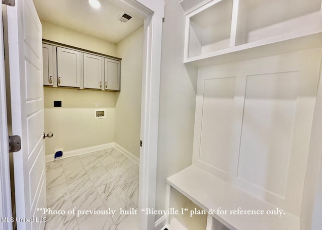6674 Montclair Ave, Southaven, MS 38672 - laundry room featuring baseboards, washer hookup, visible vents, cabinet space, and marble finish floor