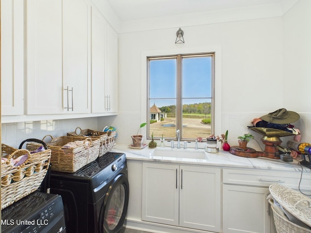 103 Honours Ln, Madison, MS 39110 - laundry room featuring washer / dryer, a sink, and cabinet space