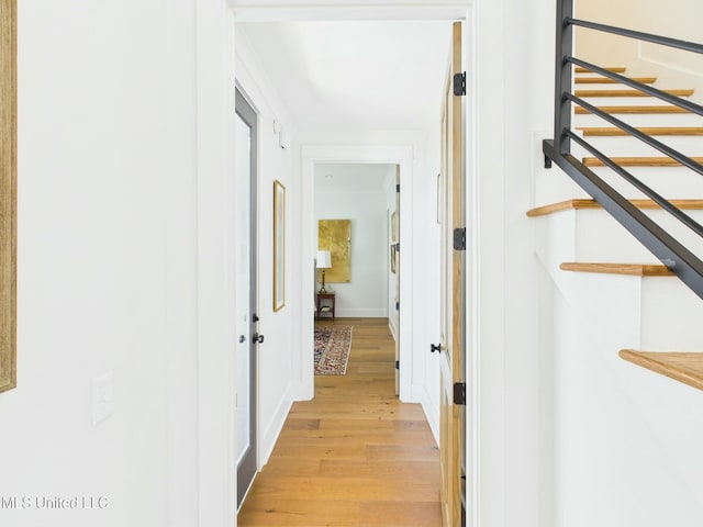 103 Honours Ln, Madison, MS 39110 - corridor featuring stairway and light wood-style floors