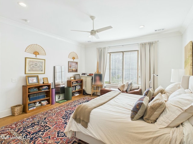 103 Honours Ln, Madison, MS 39110 - bedroom featuring a ceiling fan, ornamental molding, visible vents, wood finished floors, and baseboards