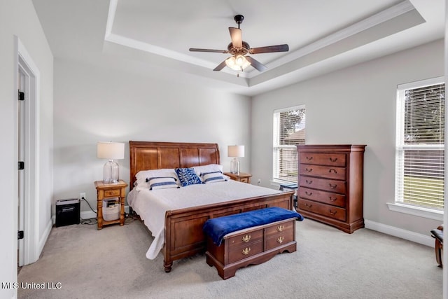 2006 Pelican Cir, Long Beach, MS 39560 - bedroom with a tray ceiling, light colored carpet, baseboards, and ceiling fan