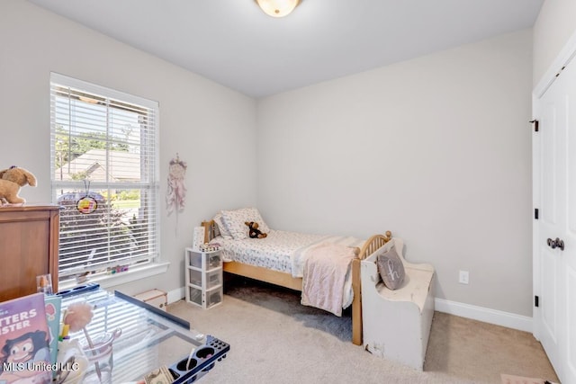 2006 Pelican Cir, Long Beach, MS 39560 - bedroom with carpet flooring and baseboards