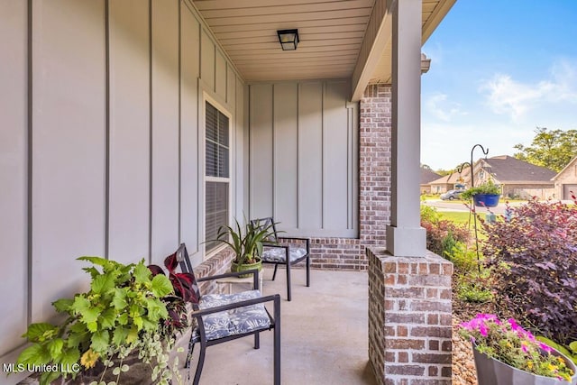 2006 Pelican Cir, Long Beach, MS 39560 - view of patio with a porch