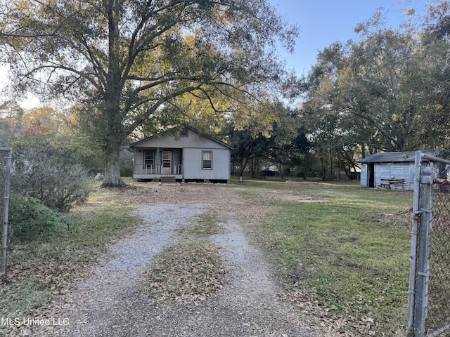 view of yard featuring covered porch