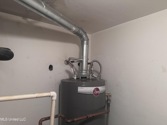903 Westwood St, Pascagoula, MS 39567 - utility room featuring water heater