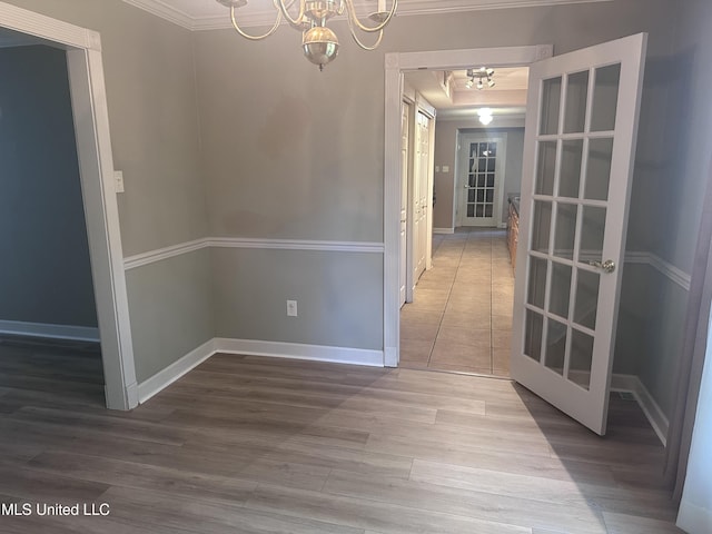 903 Westwood St, Pascagoula, MS 39567 - interior space with crown molding, baseboards, a chandelier, and wood finished floors