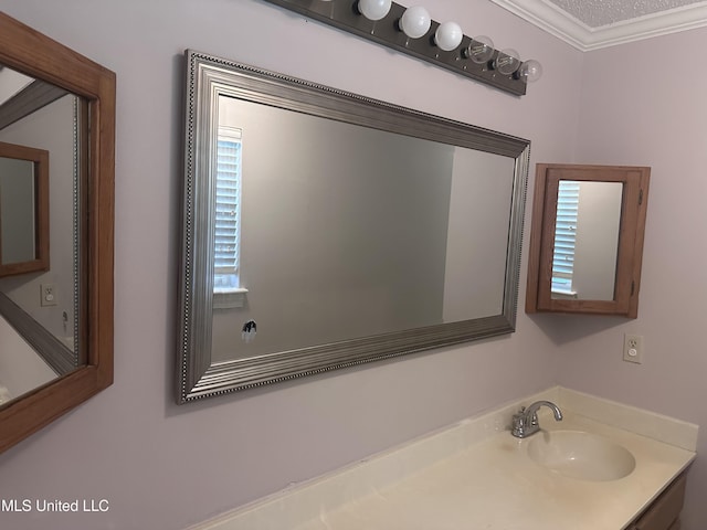 903 Westwood St, Pascagoula, MS 39567 - bathroom featuring crown molding and vanity