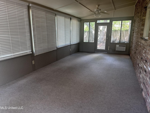 903 Westwood St, Pascagoula, MS 39567 - unfurnished sunroom with a wall mounted air conditioner
