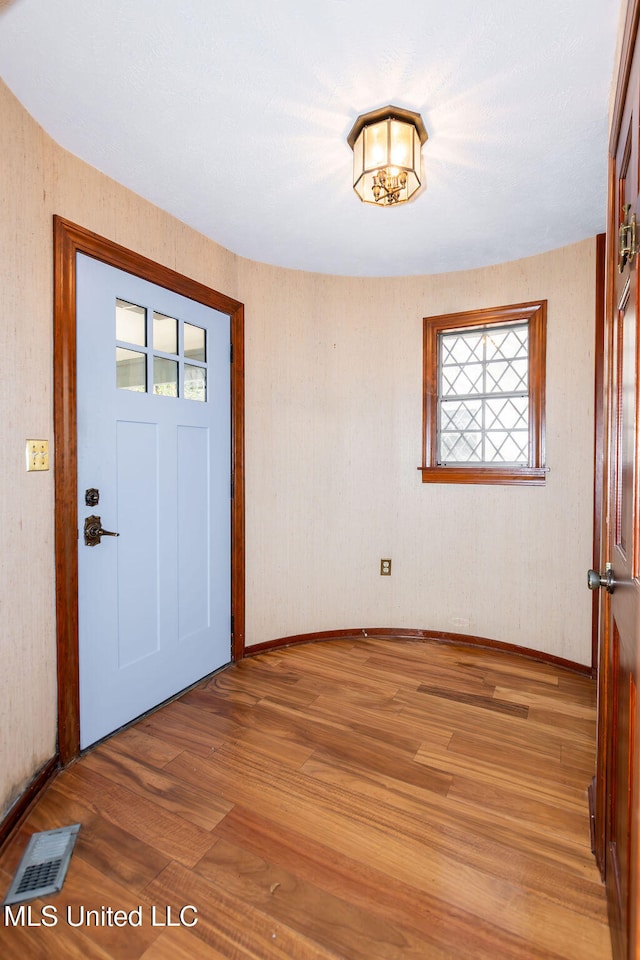 foyer with light wood-type flooring