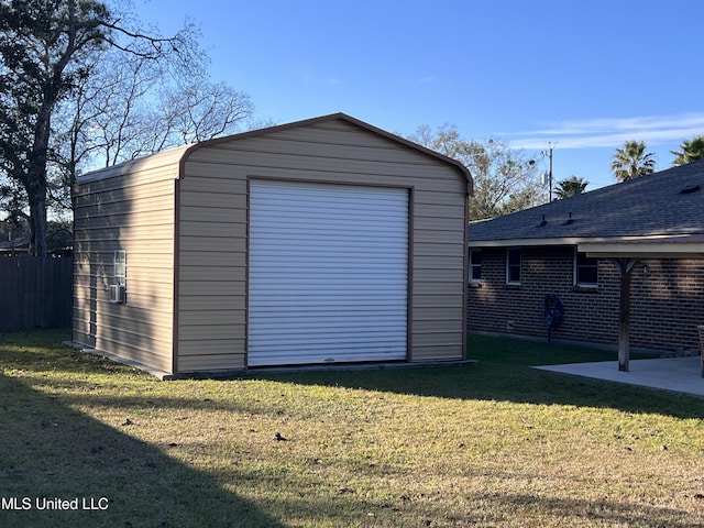 garage with a yard