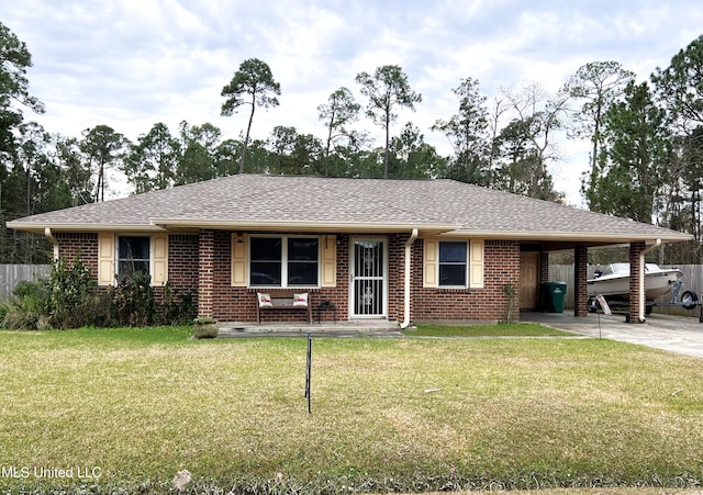 ranch-style house with a front yard and a carport