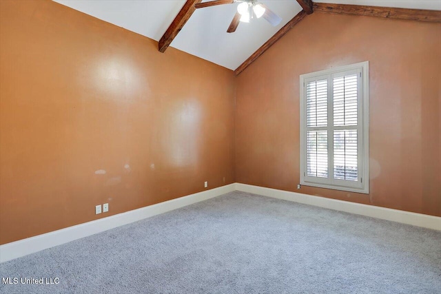 spare room featuring lofted ceiling with beams, carpet flooring, baseboards, and a ceiling fan